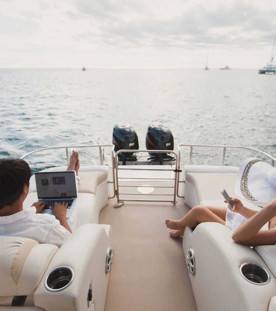 People Relaxing on a Quiet Boat